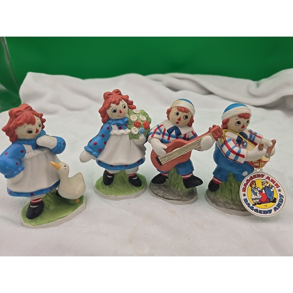 RAGGEDY ANN & ANDY PORCELAIN FIGURES (4) 1990